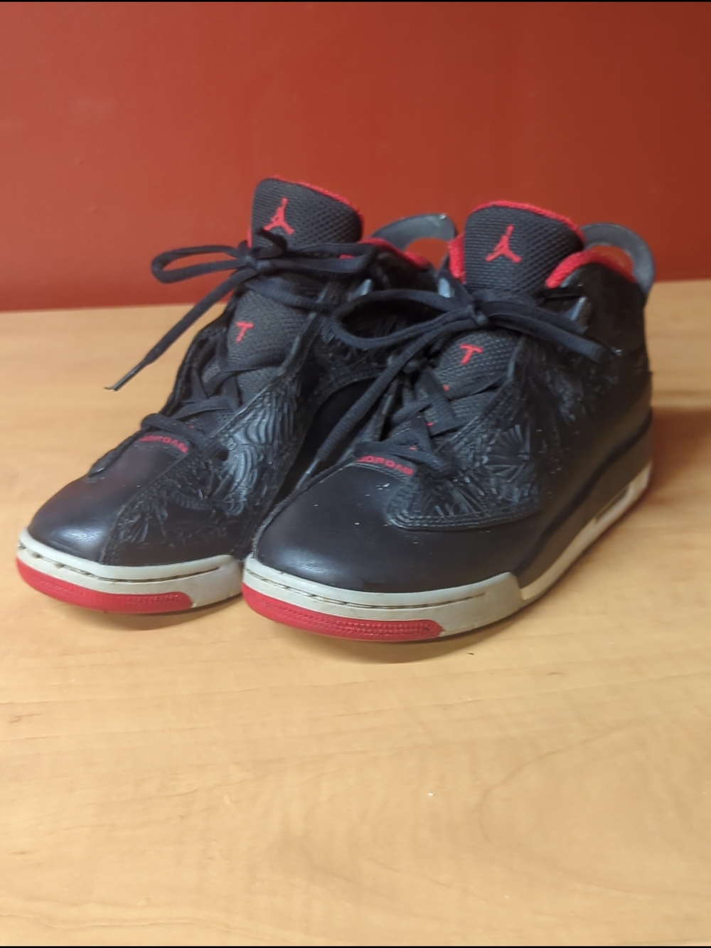 Jordan Kids Black with Red Accent Mid-Top Sneakers
